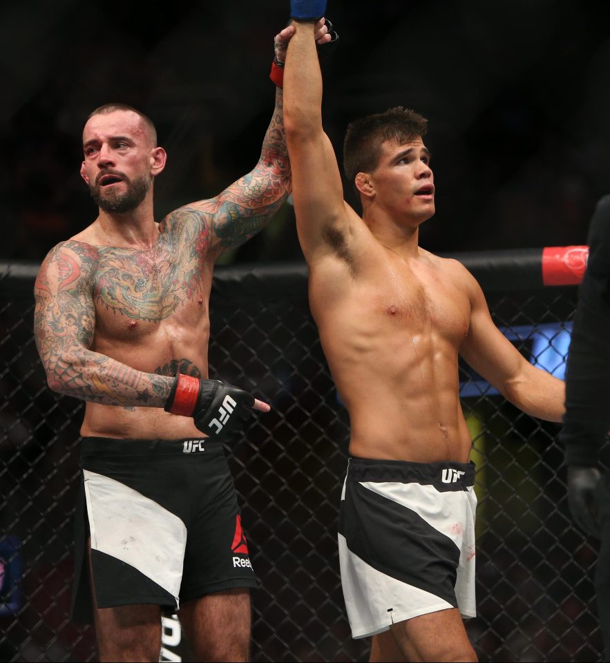 Mickey Gall celebrates victory over CM Punk at UFC 203 two years ago