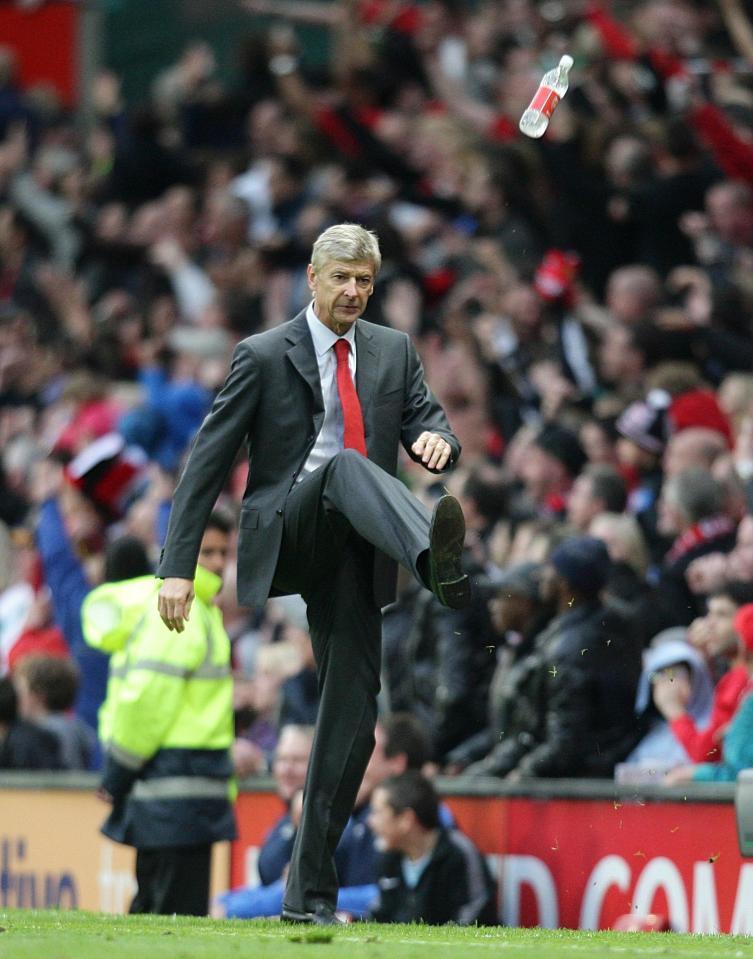 The former Arsenal manager kicking a water bottle during a match in 2009