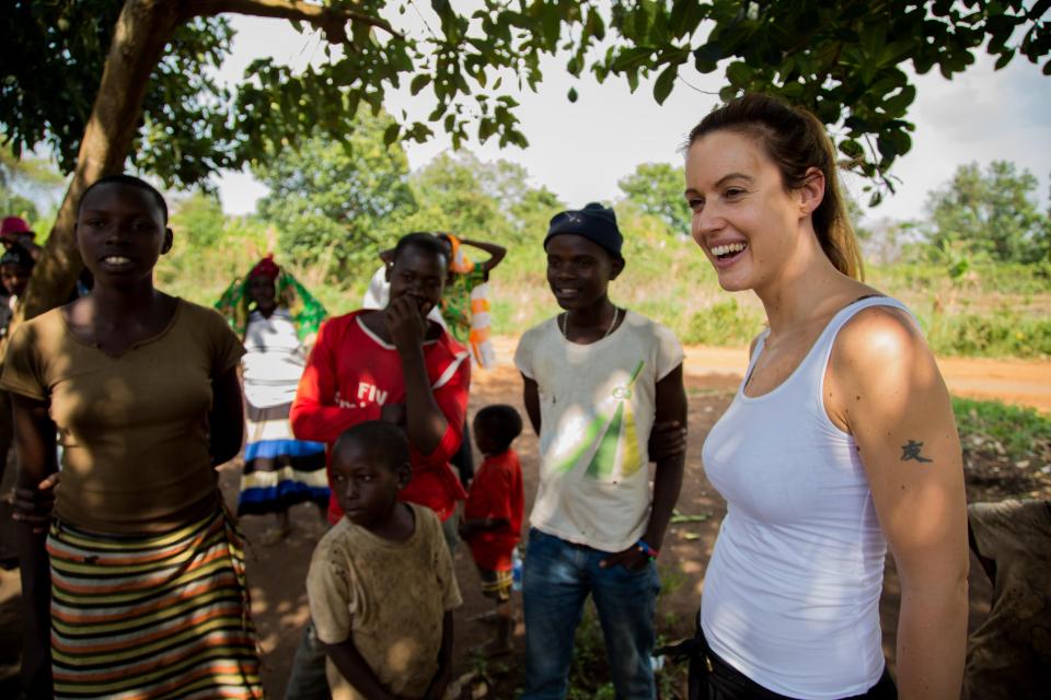  The TV present is all smiles as she chats to locals