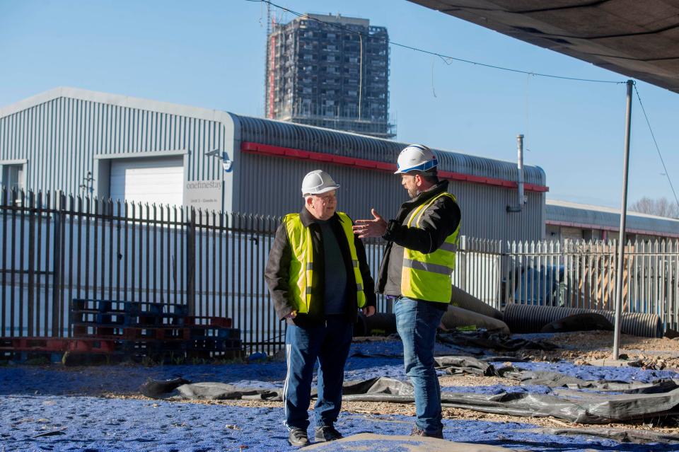  DIY SOS Nick Knowles (right) talks with Mick Delaney, senior coach of the Dale Youth Amateur Boxing Club which used to be housed on the first floor of Grenfell Tower, on the site of a brand new multi-use community space and gym that his team are building for the Grenfell community