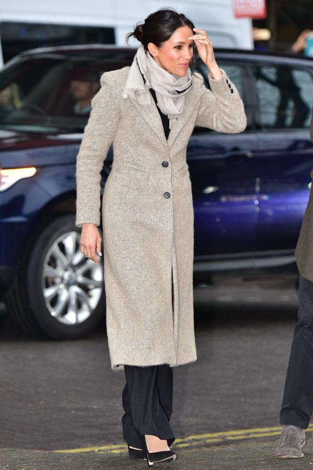  Meghan keeps it smart casual with a messy bun and smart coat for her Second Public Appearance, January 2018