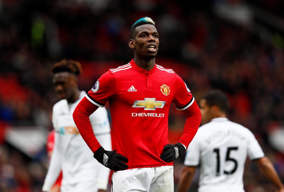  Paul Pogba insists he is happy to stay at United despite being benched