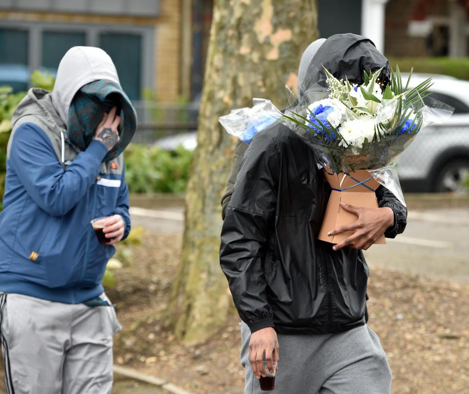  Floral tributes were left to the young man