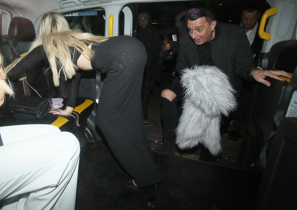  Climbing into their taxi, Chyna left little to the imagination