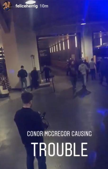  A burly security guard managed to stop the gate reaching the bus as McGregor was thwarted