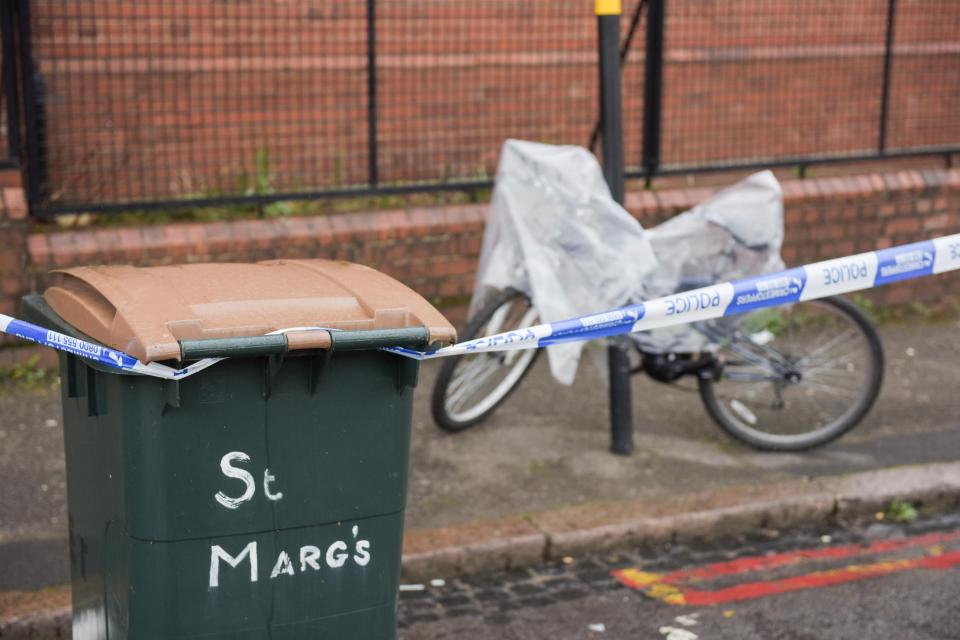  Police sealed off much of the building today while the woman was in critical condition