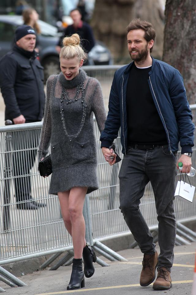  Loved-up pair pictured enjoying a stroll