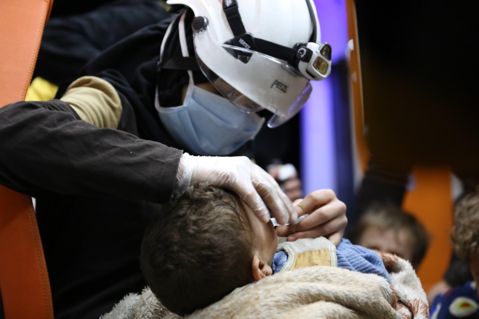 A child evacuated from Douma receives preventive medicine upon arrival in Aleppo