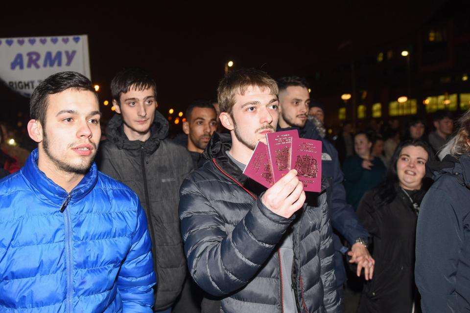  Flanked by supporters, Alfie's dad Tom Evans shows his, Kate's and Alfie's passports, as he makes a bid to take his son abroad for treatment