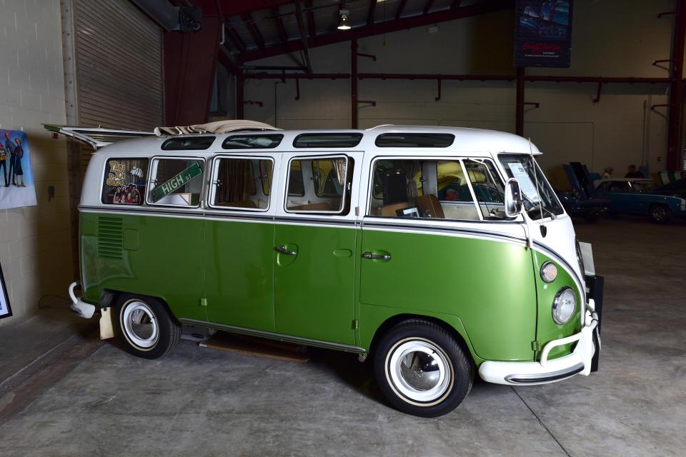  It features old-fashioned curtains and fuzzy dice hanging from the rear-view mirror