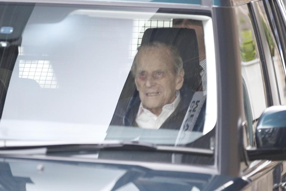  Prince Philip smiles as he leaves hospital following his hip op