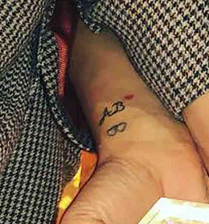  The TV presenter recently had Andrew's initials tattooed on to her wrist