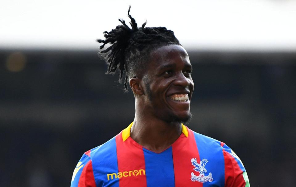 Wilfried Zaha is being chased by Man City boss Pep Guardiola