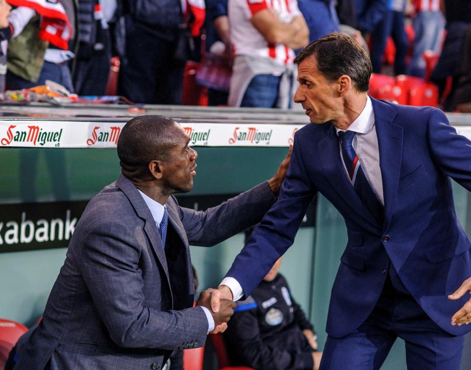  Deportivo manager Clarence Seedorf shakes hands with Athletic Bilbao boss Jose Angel Ziganda