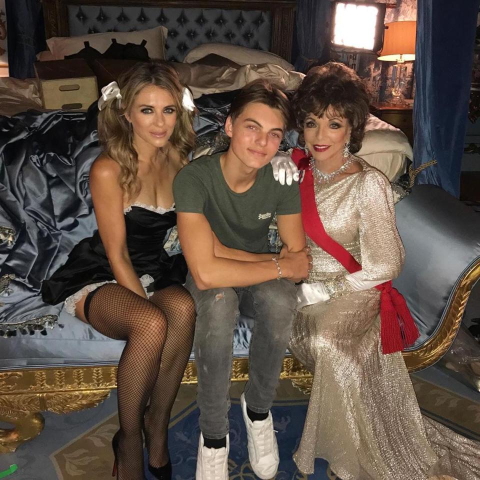  She stars on the show with her son Damian and Joan Collins