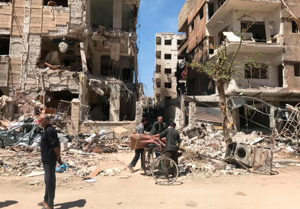  Damaged buildings in the town of Douma, the site of a suspected chemical weapons attack, near Damascus