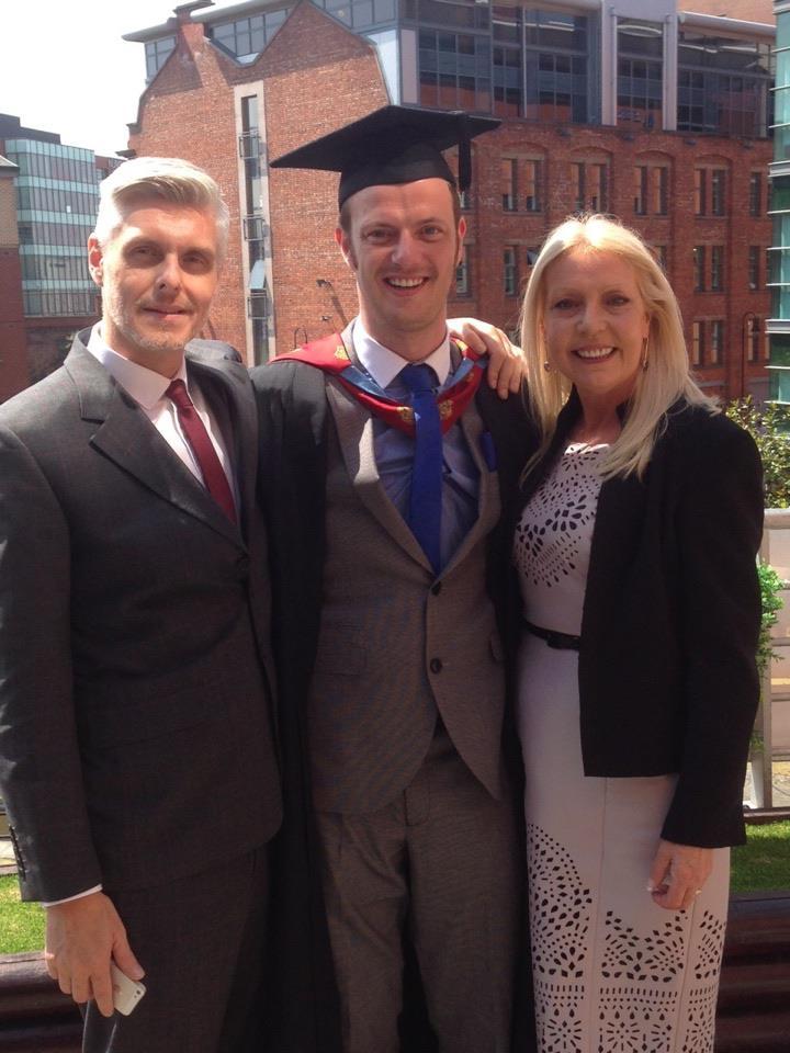  Jay, centre, with his partner Gareth, left, and mother Janet right