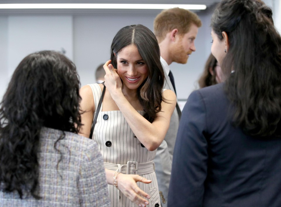 Prince Harry and Meghan Markle pictured at the reception