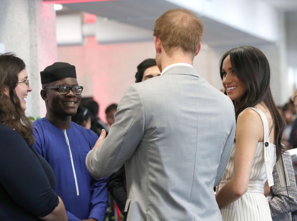 Guests marvel at the couple, as they enjoy the reception at Queen Elizabeth II Conference Centre