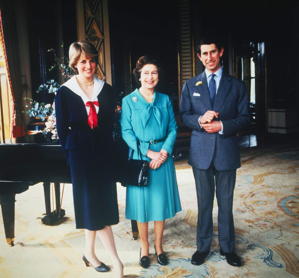  In 1981, before she got hitched to Charles, Di wore a navy and white coat to Buckingham Palace