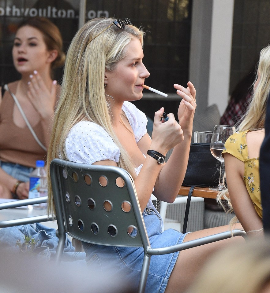 She was also seen lighting a cigarette alongside George Lineker, Tina Stinnes and Tom Dolemore