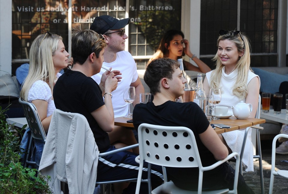 The group appeared to be having a whale of a time at the fashionable Kings Road eatery