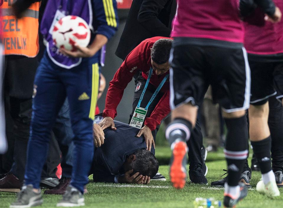  Besiktas coach Senol Gunes was struck during the second half against Fenerbahce