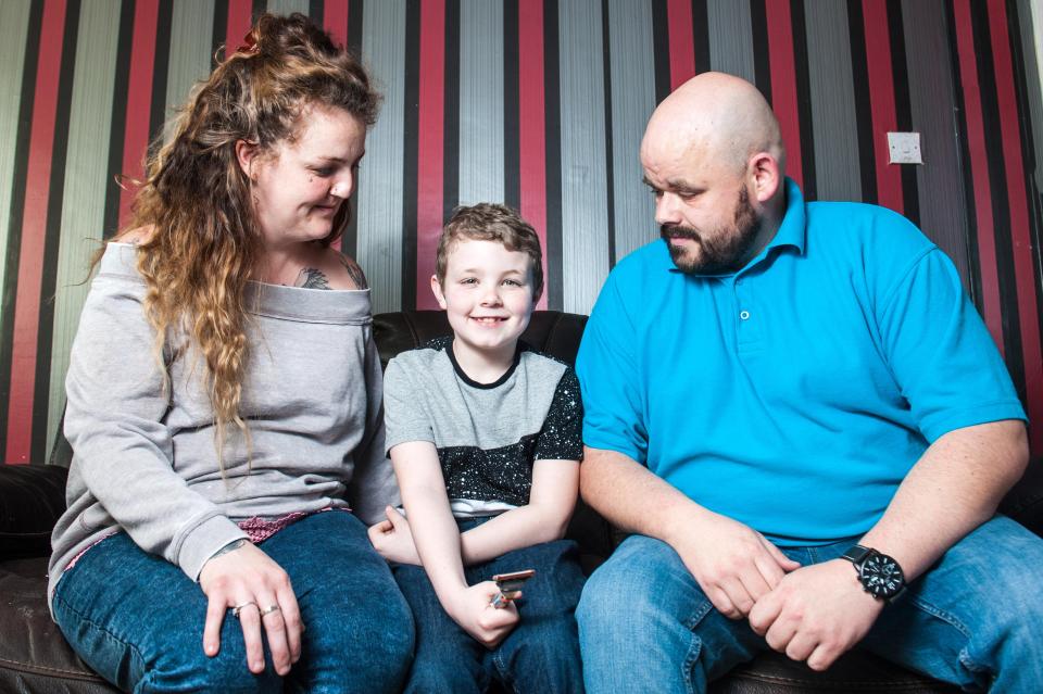  Billy-Joe Cain, centre, with mum Kylie and step-dad Craig