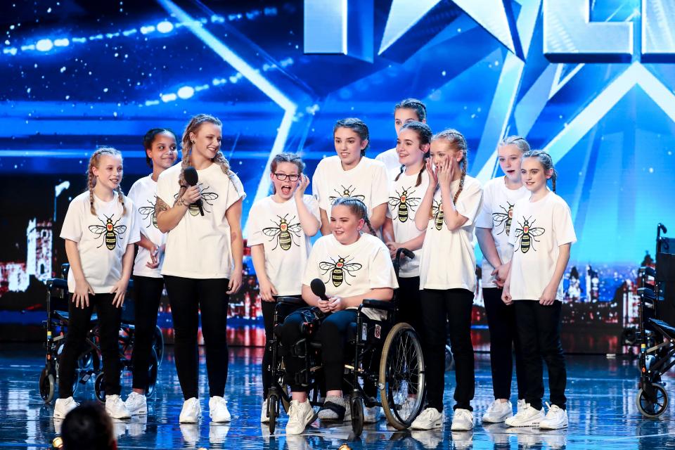  But her group 'Rise' perform with Hollie in the wheelchair to help her get back into dancing