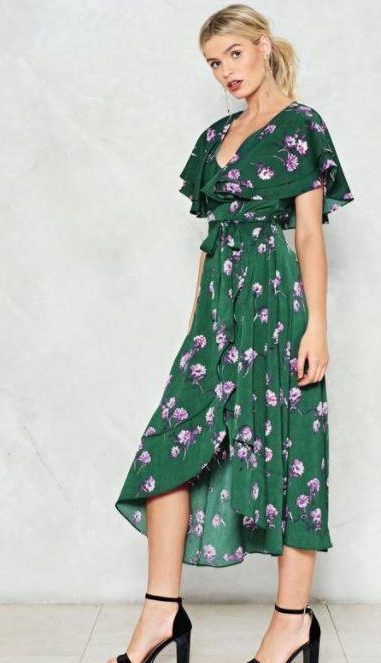  Drive your friends green with envy thanks to this ruffled dress that comes with a striking v-shaped neckline