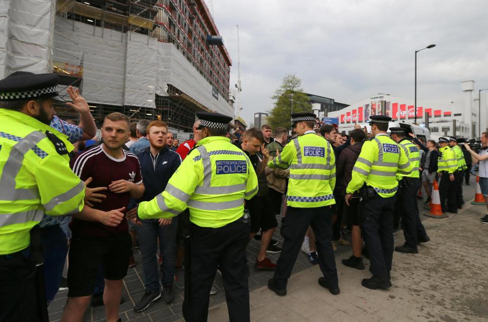  Police had to restrain fans prior to kick-off as tempers flared outside Wembley