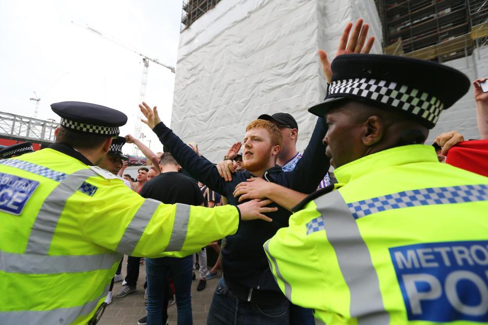  Fans had to be separated from each other ahead of the match between the two Premier League giants