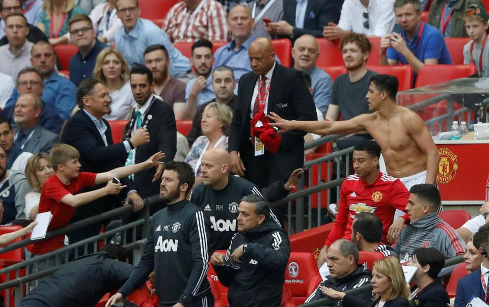  A young fan bags the goalscorer's shirt to remember the semi-final by