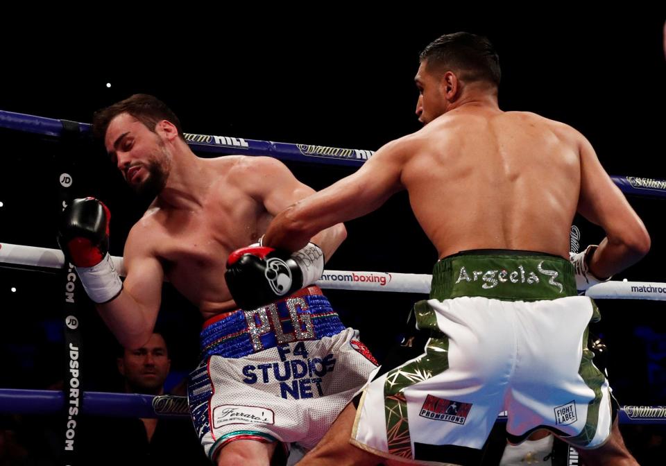 Amir Khan had his Canadian opponent on the floor after 18 seconds