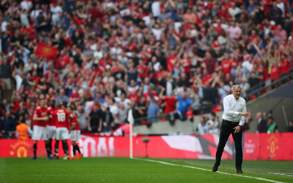  Jose Mourinho celebrates Alexis Sanchez's goal against Spurs at Wembley