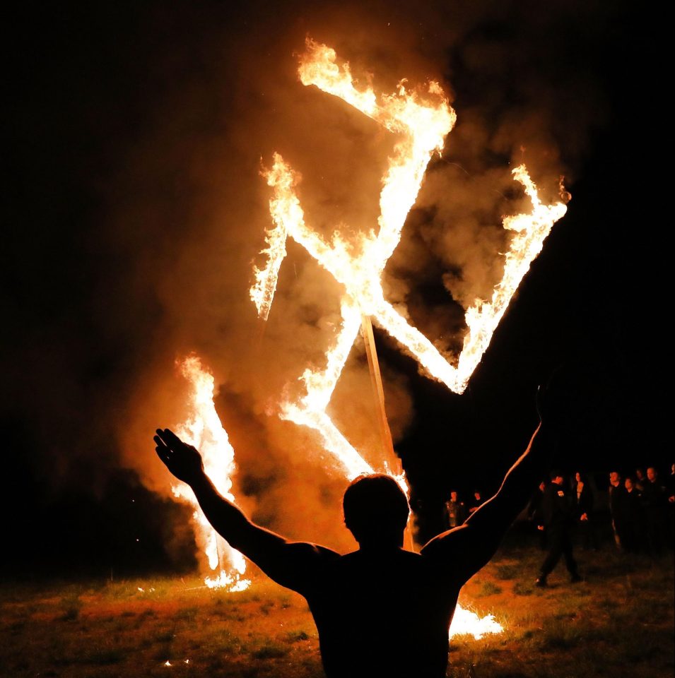  The rituals were eerily reminiscent of KKK cross-burning ceremonies