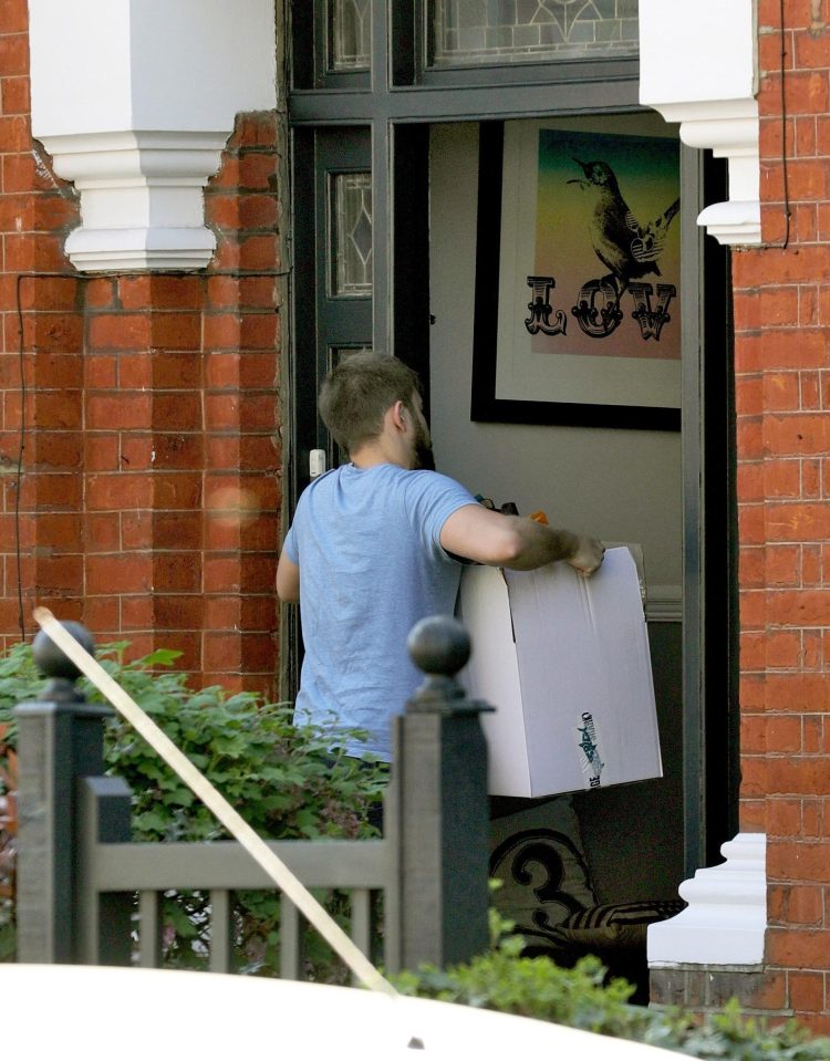  Tom carried a large box through Tamzin's door