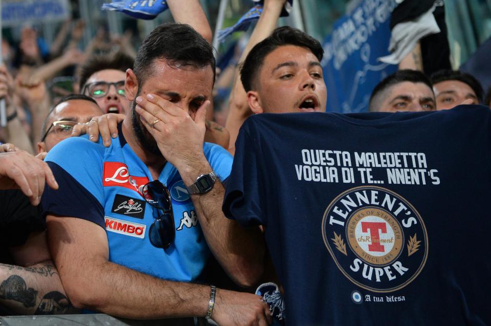 One Napoli fan poses with a Tenant's Super t-shirt