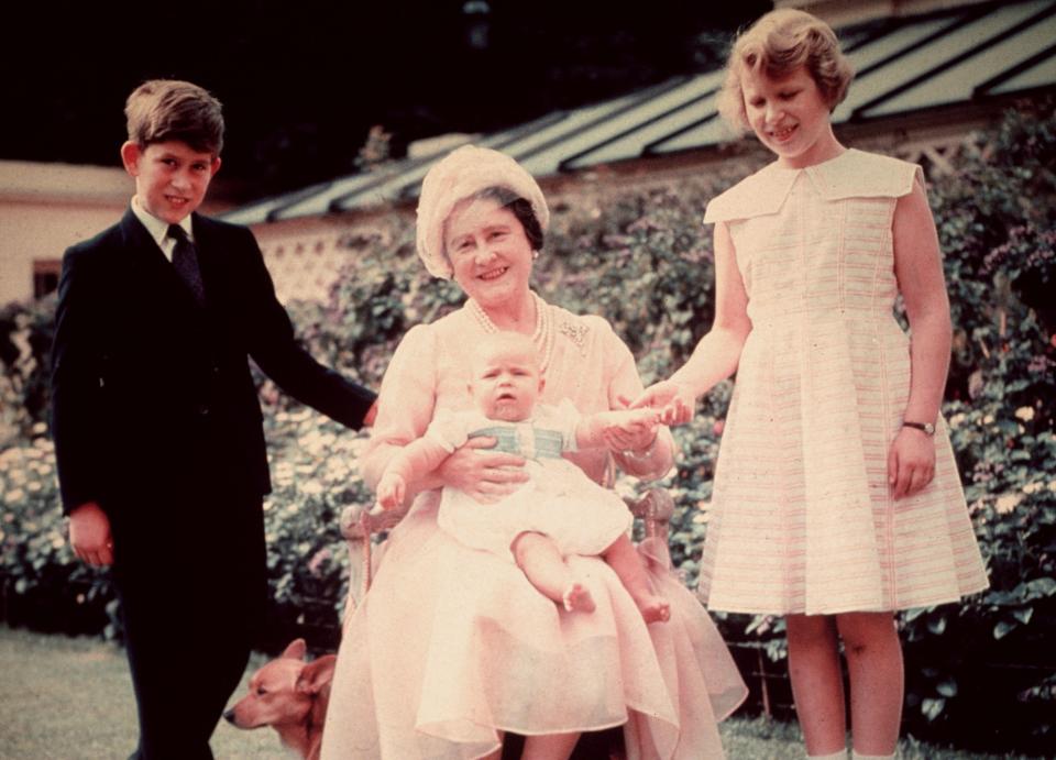  Queen Elizabeth poses with her mother,Prince Charles, Princess Anne, and a baby Prince Andrew