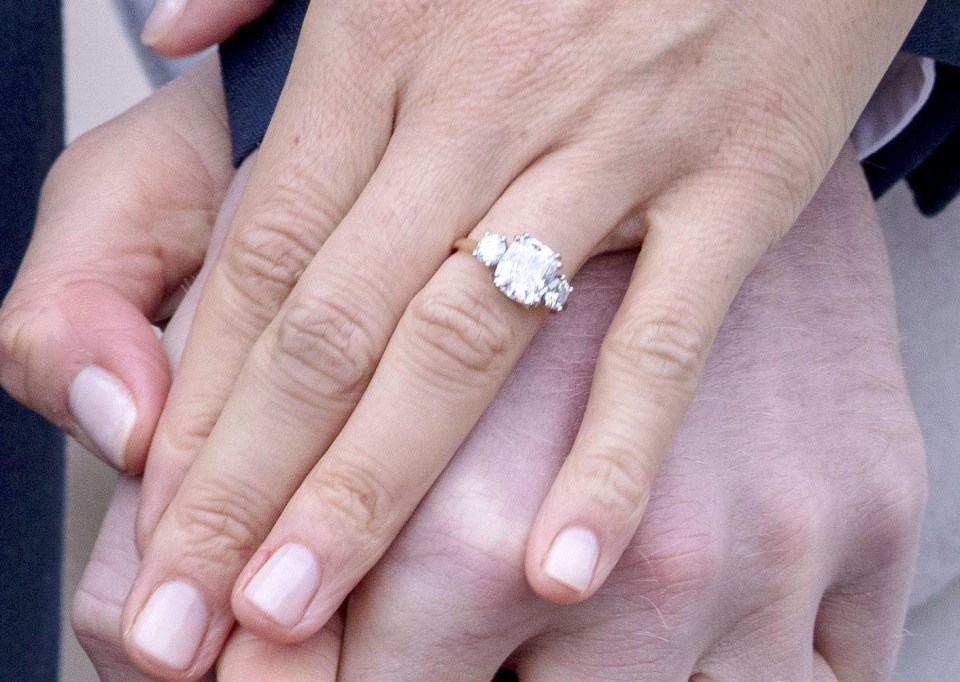 Prince Harry designed Meghans ring, which is made from three diamonds