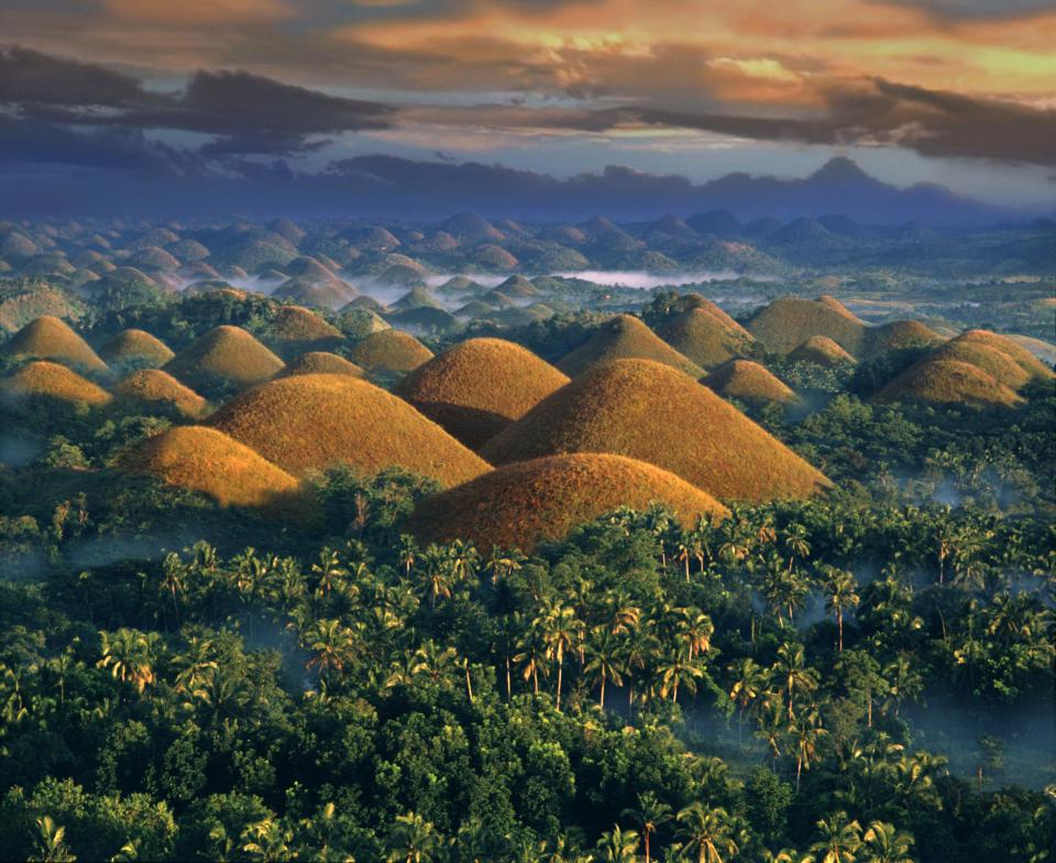 The Chocolate Hills in the Bohol province of the Philippines, created by bedrock eroded by rainfall 