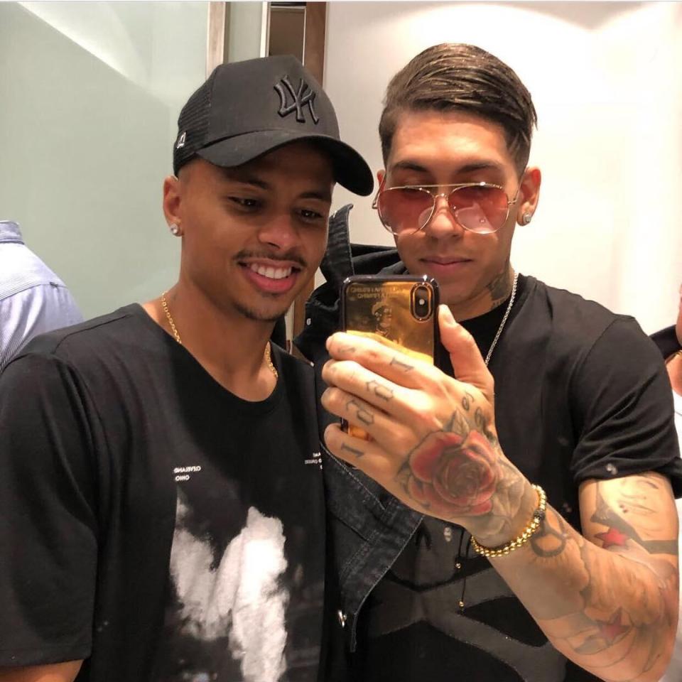  Liverpool's extravagent striker Roberto Firmino also landed a phone to match his jewellery