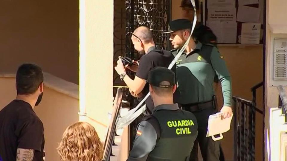 The Spanish Civil Guard take snaps of the scene