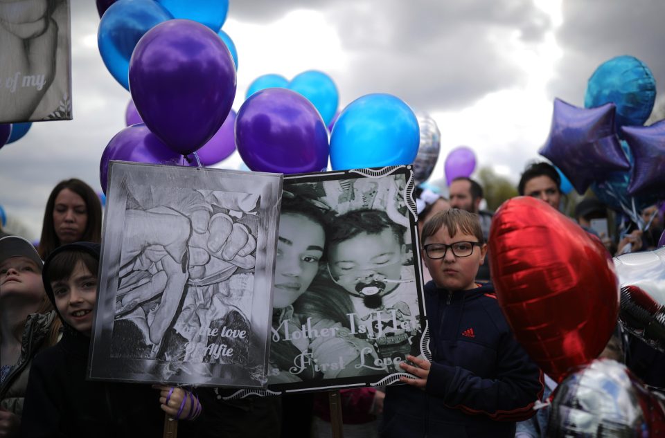  Supporters held up posters and chanted Alfie's name as they remembered the tragic tot