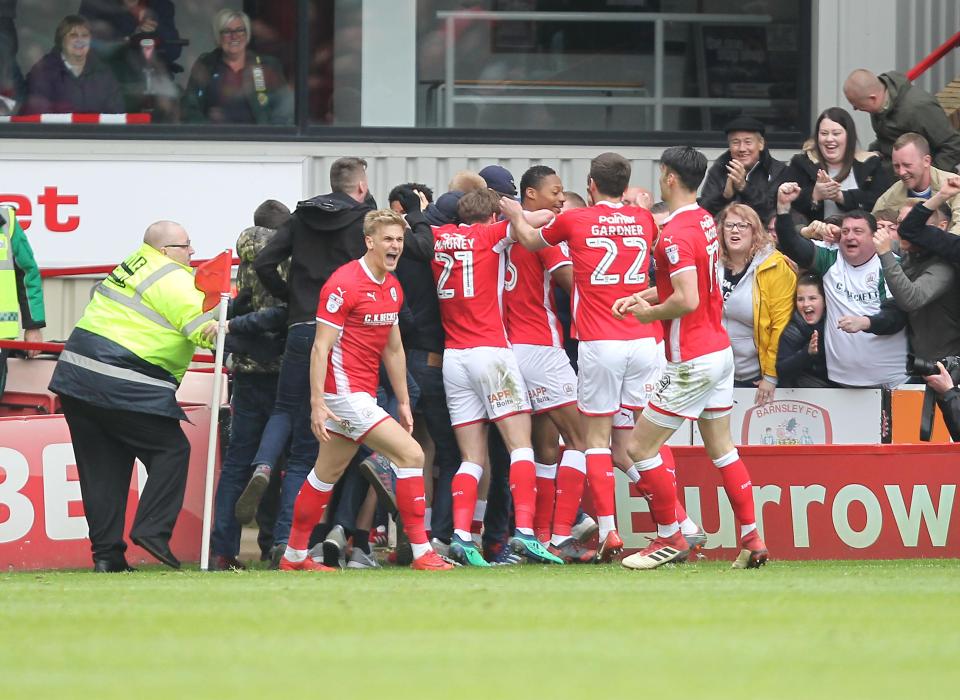  Barnsley celebrate their two goal lead with the fans.