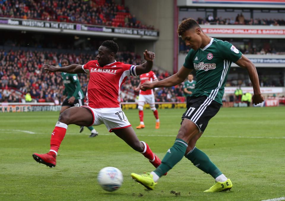  Andy Yiadom dives in to block Oliver Watkins shot.