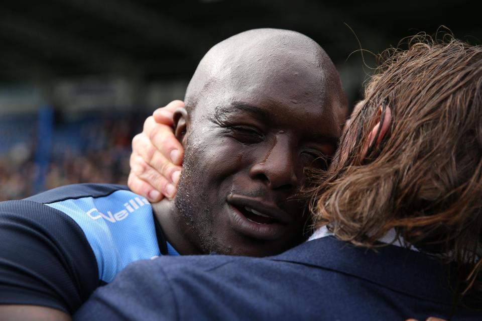  Adebayo Akinfenwa cries in joy after securing promotion with Wycombe