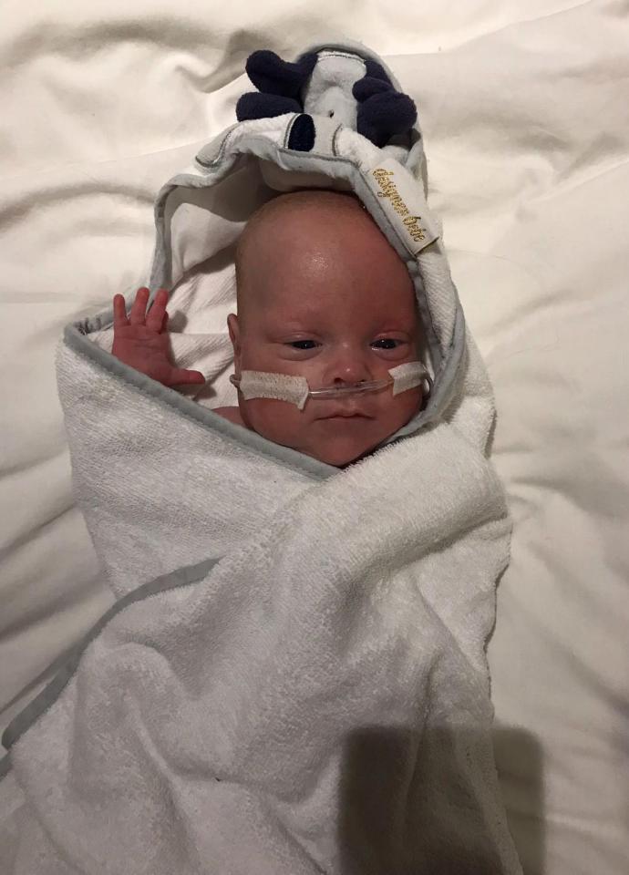  Mum Michelle was unable to hold him for his first 12 days, until he grew stronger