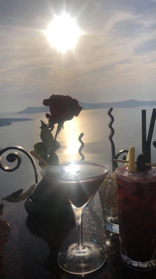 Caroline posted a snap of a romantic sunset dinner during their celebration trip 