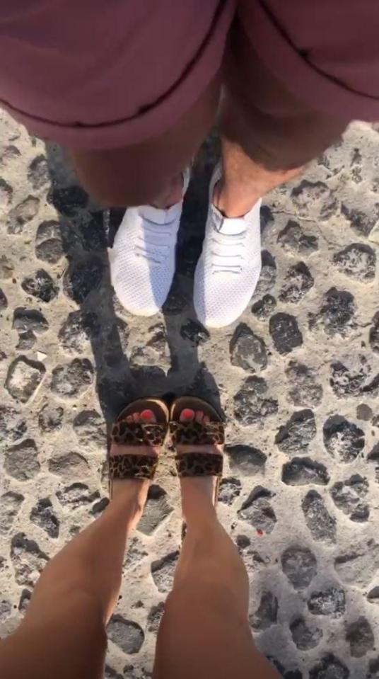 The loved-up presenter even shared snaps of their feet on the cobbles 